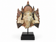 Load image into Gallery viewer, Masque de Ganesh en bois sculpté, coiffe rouge et or, monté sur socle noir