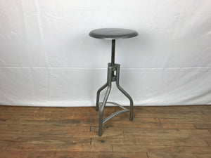 Adjustable steel stool